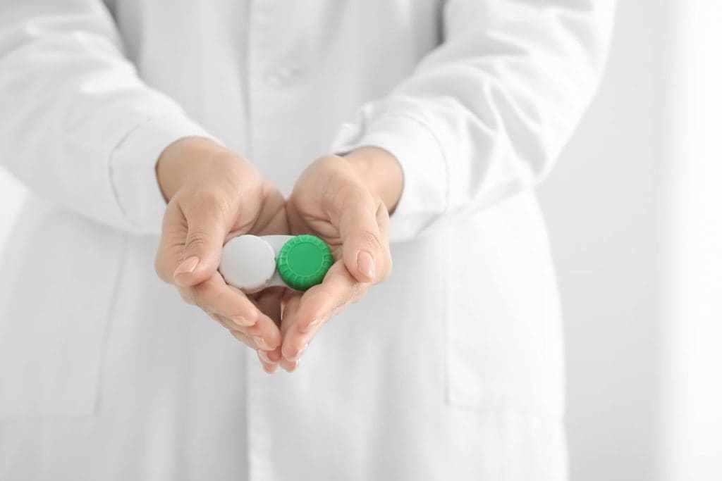 female-doctor-holding-contact-lens-case