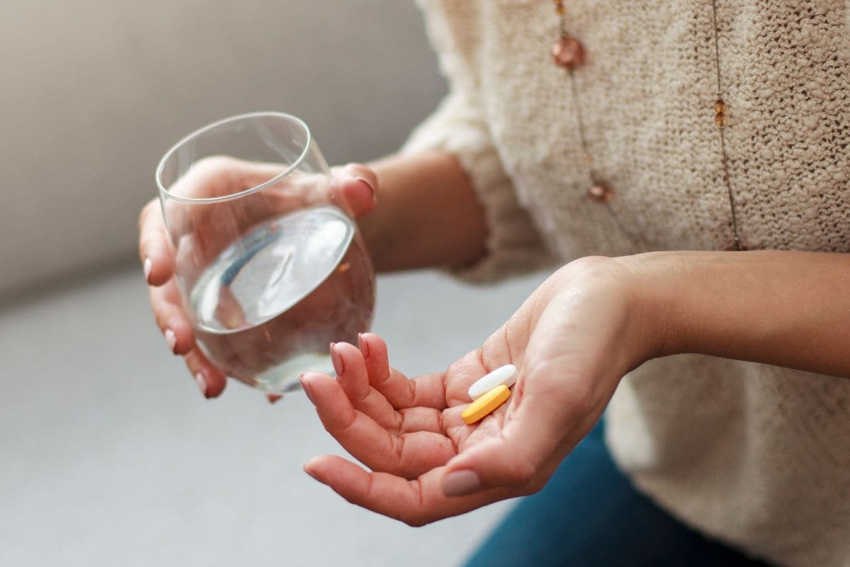woman-taking-vitamins
