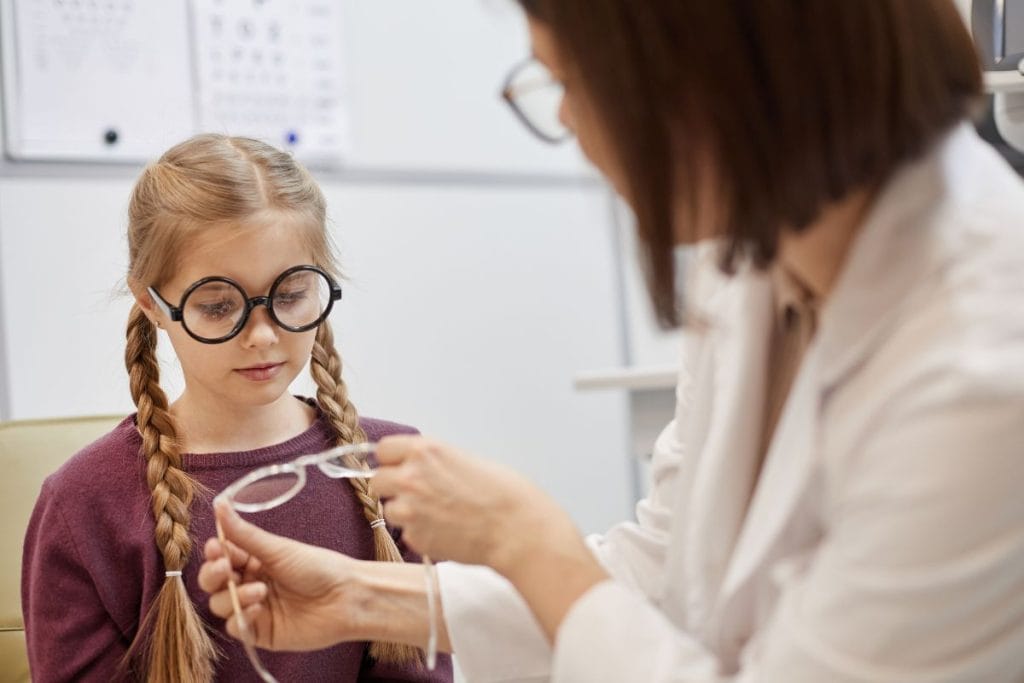 little-girl-choosing-glasses
