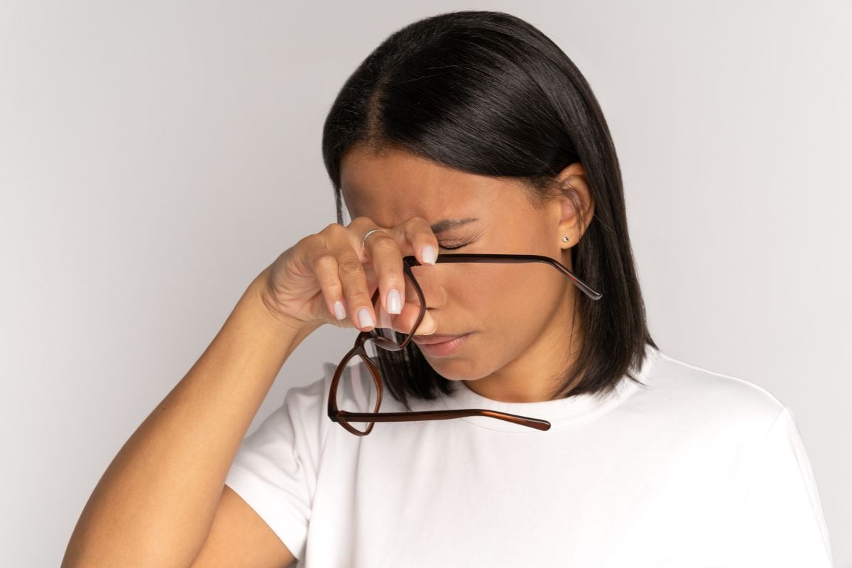 tired-african-woman-taking off-glasses-rubbing-nose-bridge-suffer-from-strain-and-dry-eyes-syndrome